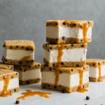 Caramel Chocolate Chip Cookie Ice Cream Sandwiches :Ultimate Summer Bliss 6 Caramel chocolate chip cookie ice cream sandwiches stacked on a plate